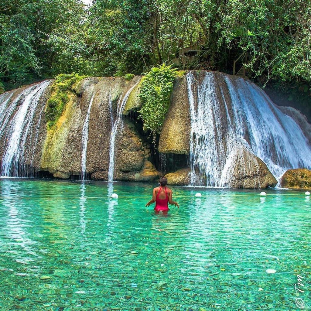 Woman in Red Swimsuit at Reach Falls, Portland, Jamaica