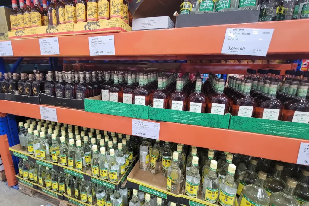 Liquor section inside a Jamaican supermarket with rum and spirits for sale