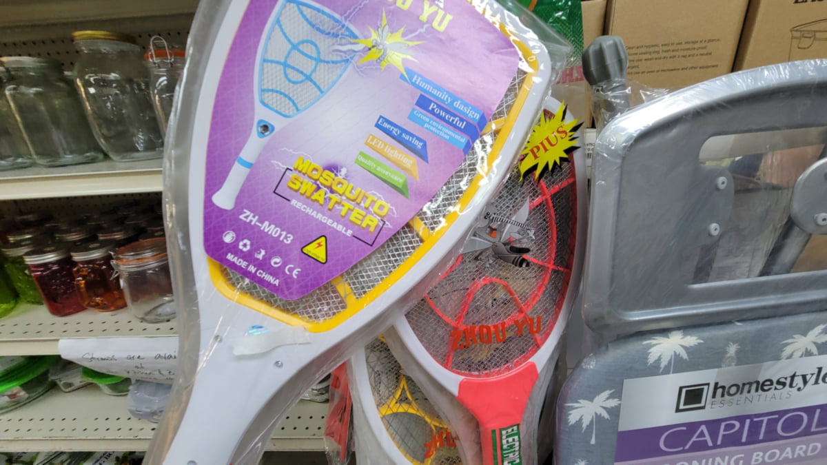 mosquito-zapper-swatter-jamaica Mosquito zapper swatter rackets on display in a Jamaican supermarket for personal protection.
