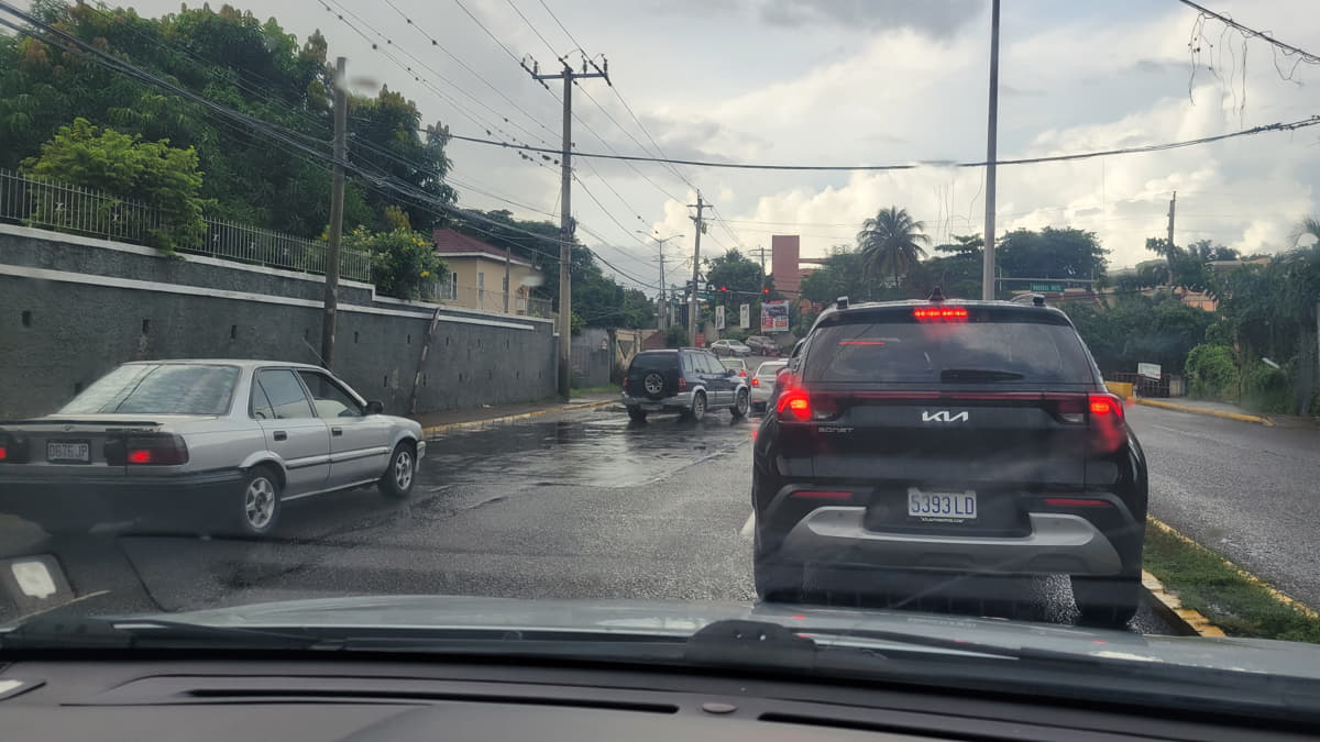 november-rain-kingston-jamaica November rain in Kingston, Jamaica, showing city streets and wet weather typical of the season.