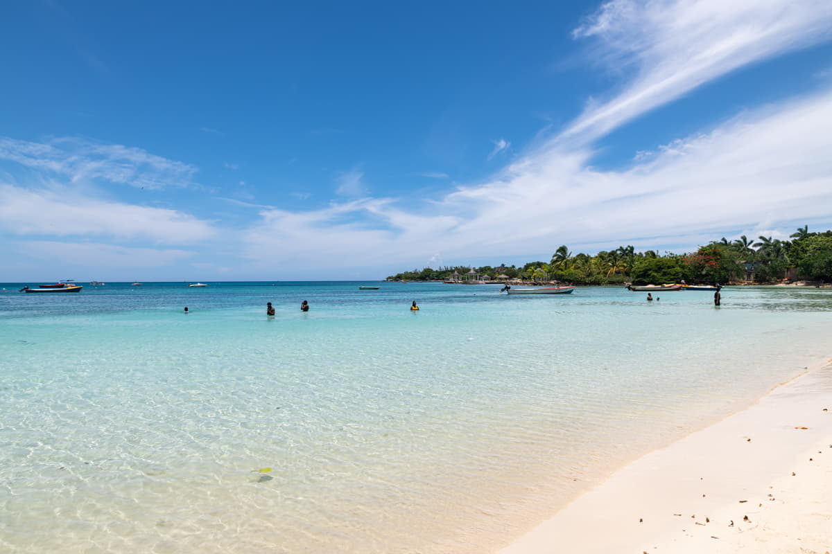 puerto-seco-beach Scenic view of Puerto Seco Beach showcasing clear skies and calm waters.