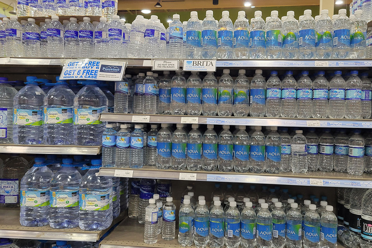 Bottled water on display on supermarket shelves in Jamaica.