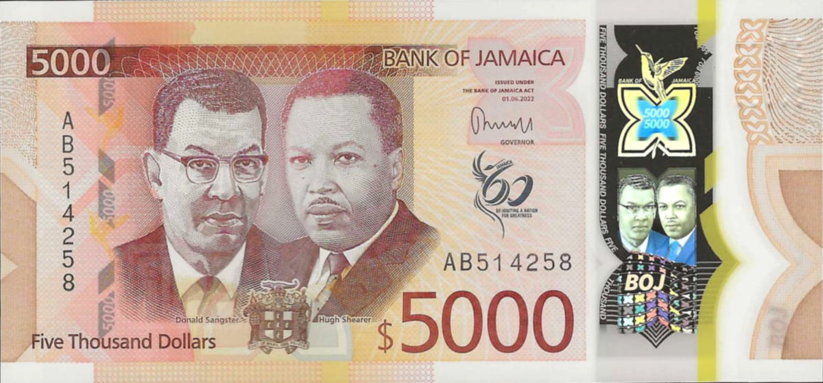 Jamaica's highest denomination banknote: the orange $5,000 polymer bill featuring Donald Sangster and Hugh Shearer.