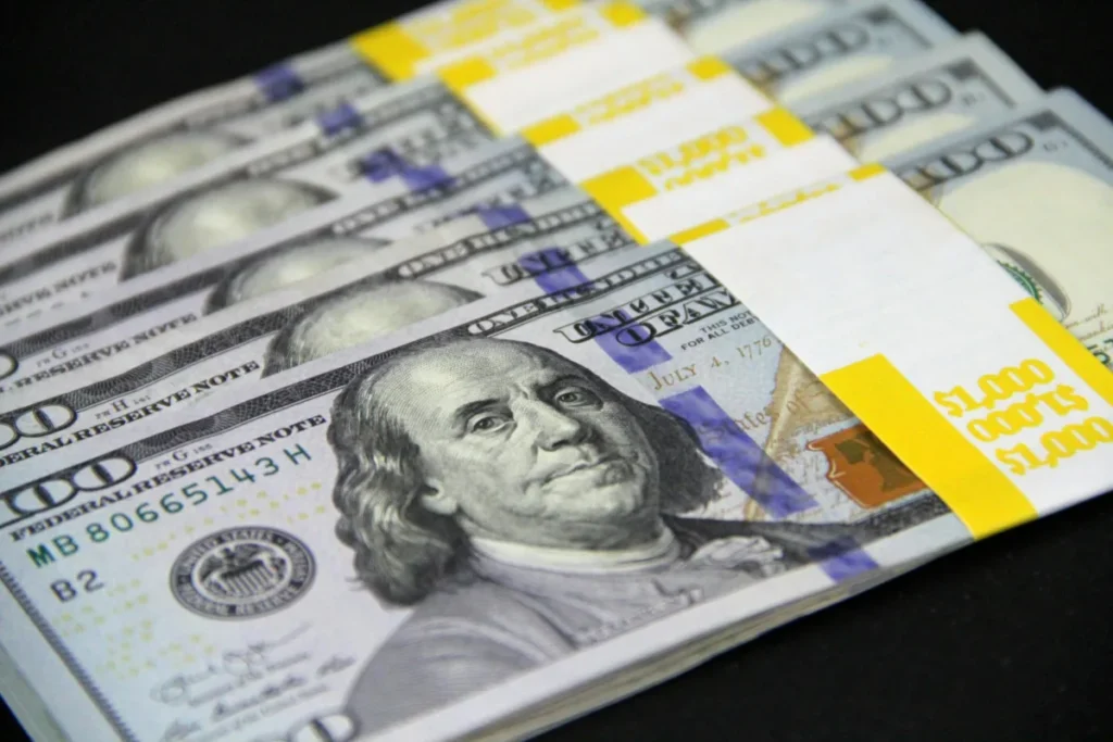 Bundles of US dollar cash carried by a traveler entering Jamaica